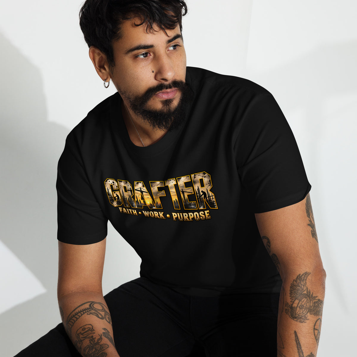 Muslim By Nature™ GRAFTER Builder T-shirt in Black, gold and black construction-themed Grafter design – front view